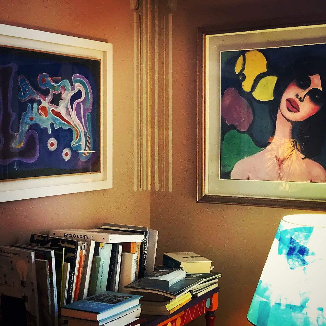 Paintings and art books in the hall